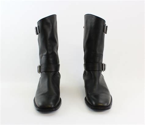 chanel black leather asymmetrical zip stacked heel moto boots|High boots .